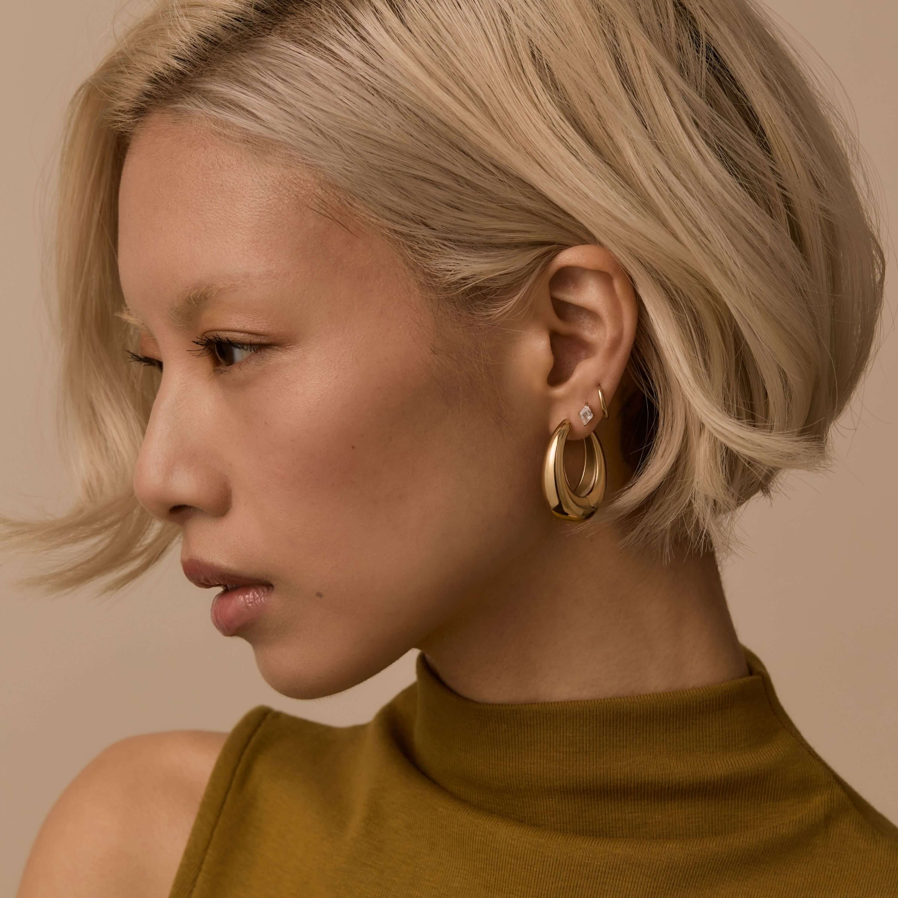 Oeuf Hoops and Classic Huggie Hoops, 11mm with Celestial Crystal Lozenge Nap Earrings on Model
