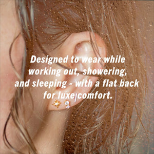 Girl with Nap Earrings and overlay text that says: Designed to wear while working out, showering, and sleeping - with a flat back for luxe comfort.