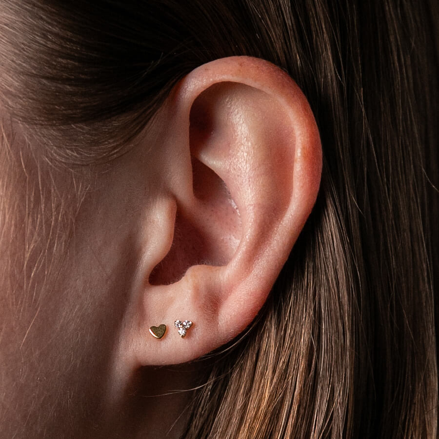 Classic Heart Studs in Titanium (Gold) on model