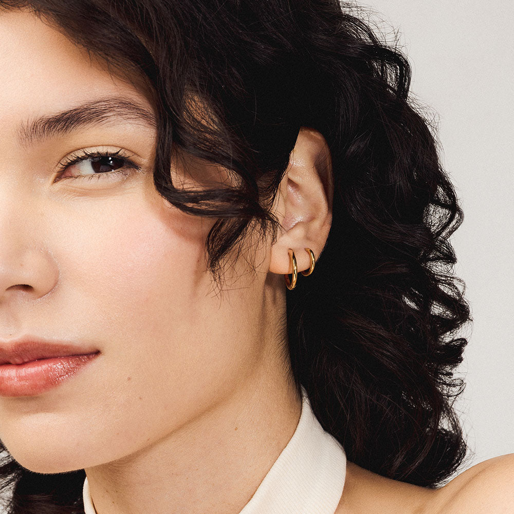 Classic Hoop and Classic Huggie in Titanium in Gold on model