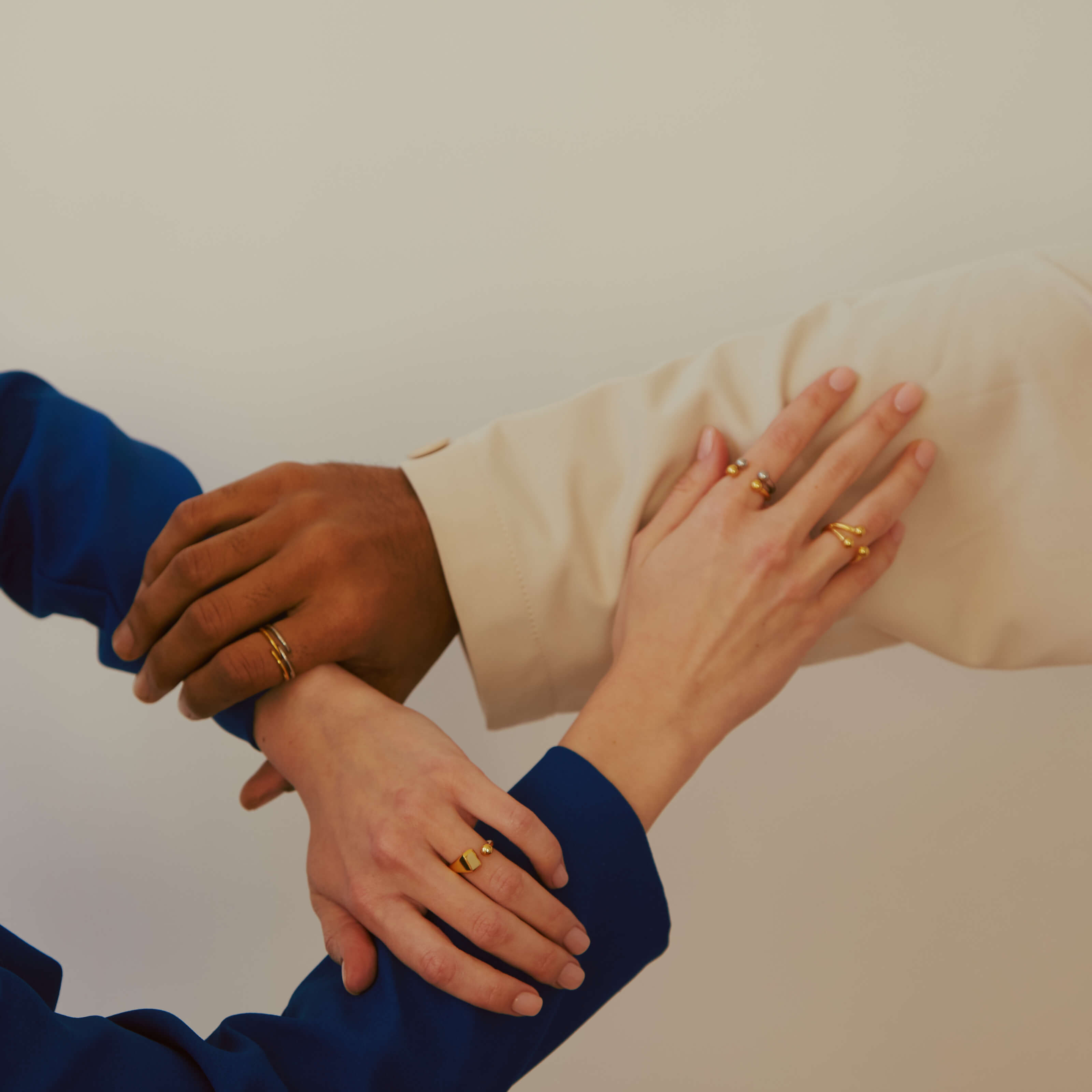 Floating Orb Ring II and III and Floating Orb Signet Ring (Gold) on Model