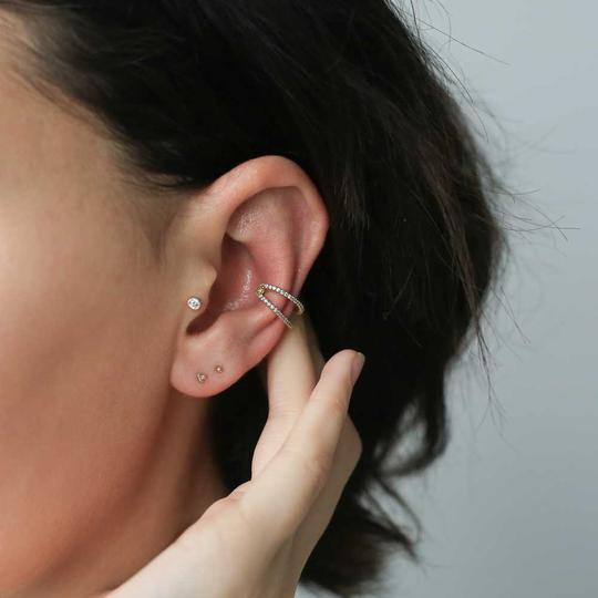 Tiny Trinity Threaded Flat Back Earring (Titanium - Gold) on model