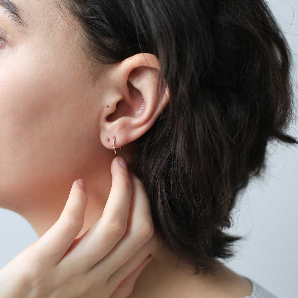 Shooting Star Open Hoop Earrings on model