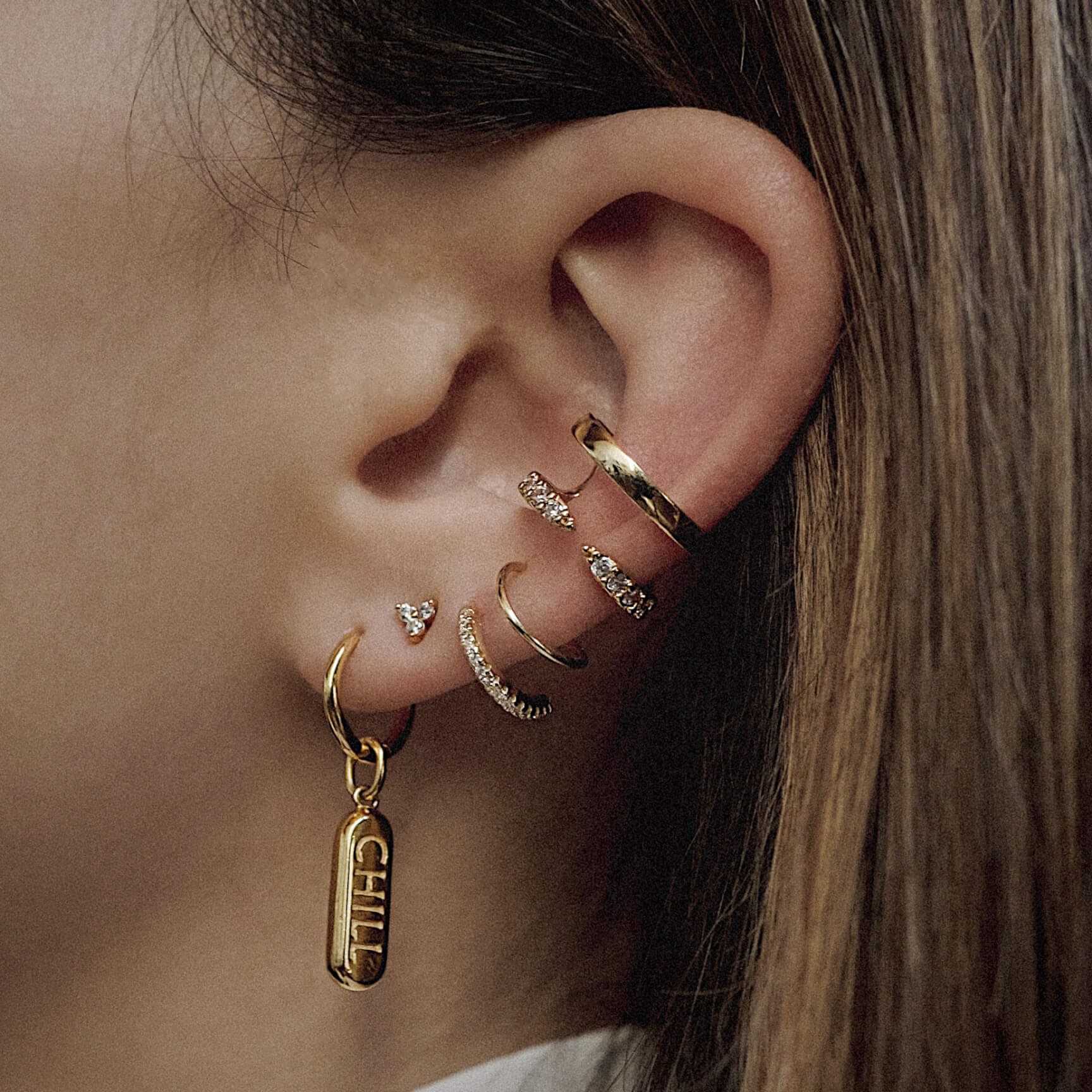 Mini Crystal Trinity Studs on model