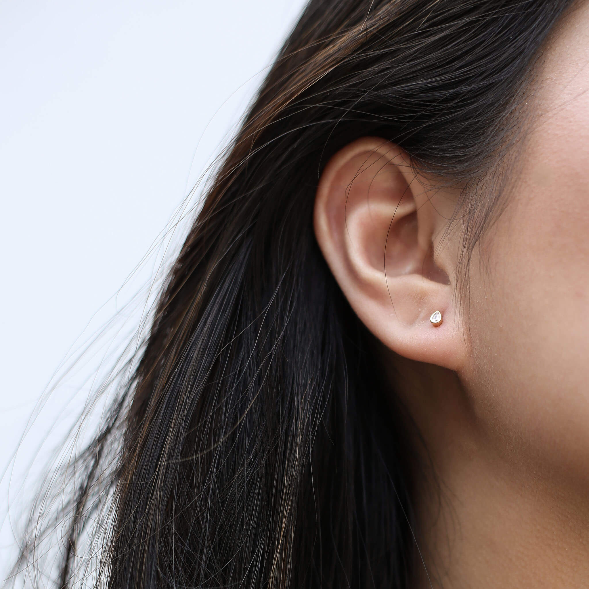 Tiny Dewdrop Threaded Flat Back Earring (Titanium - Gold) on model
