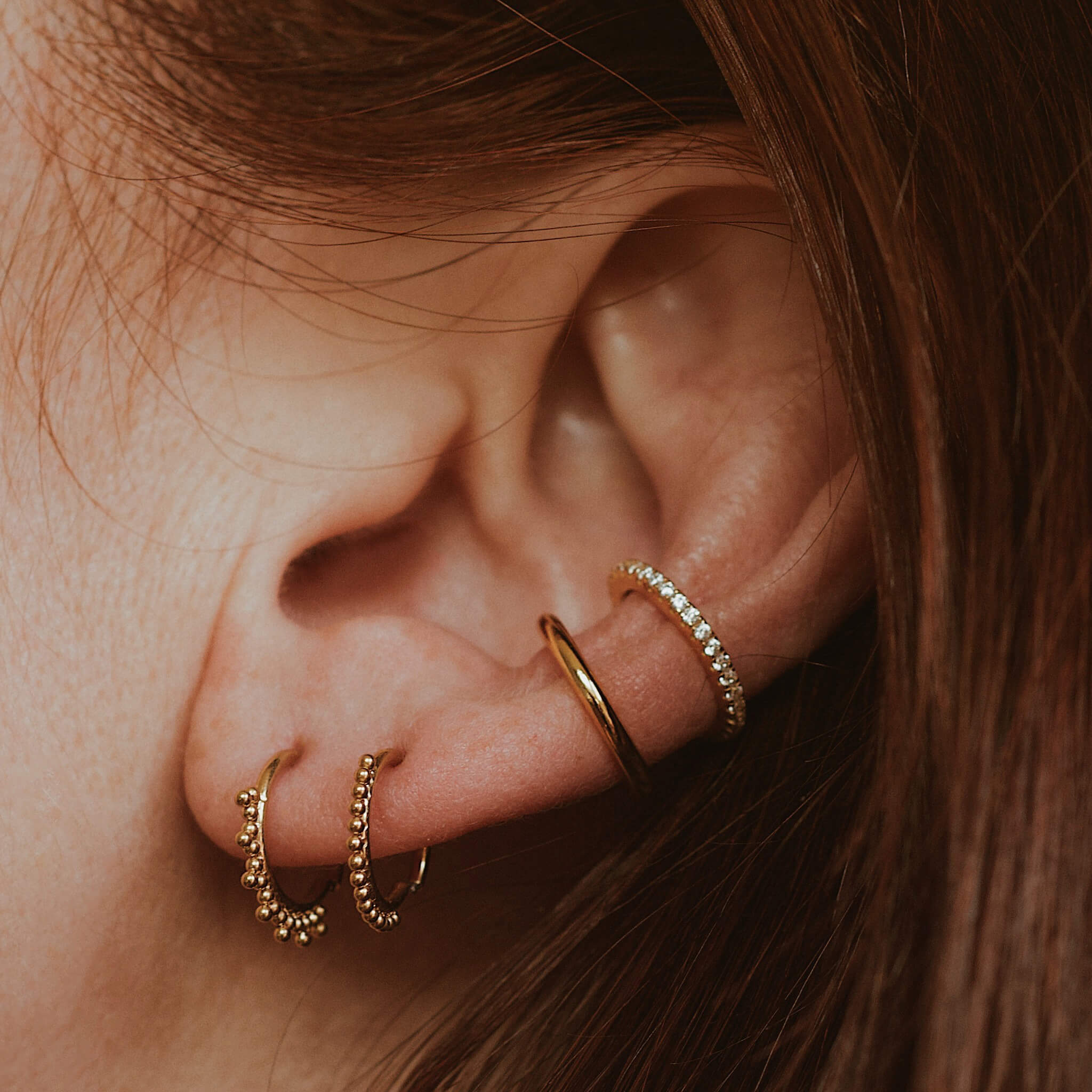 Eternity Cartilage Hoop on model (Titanium - Gold)