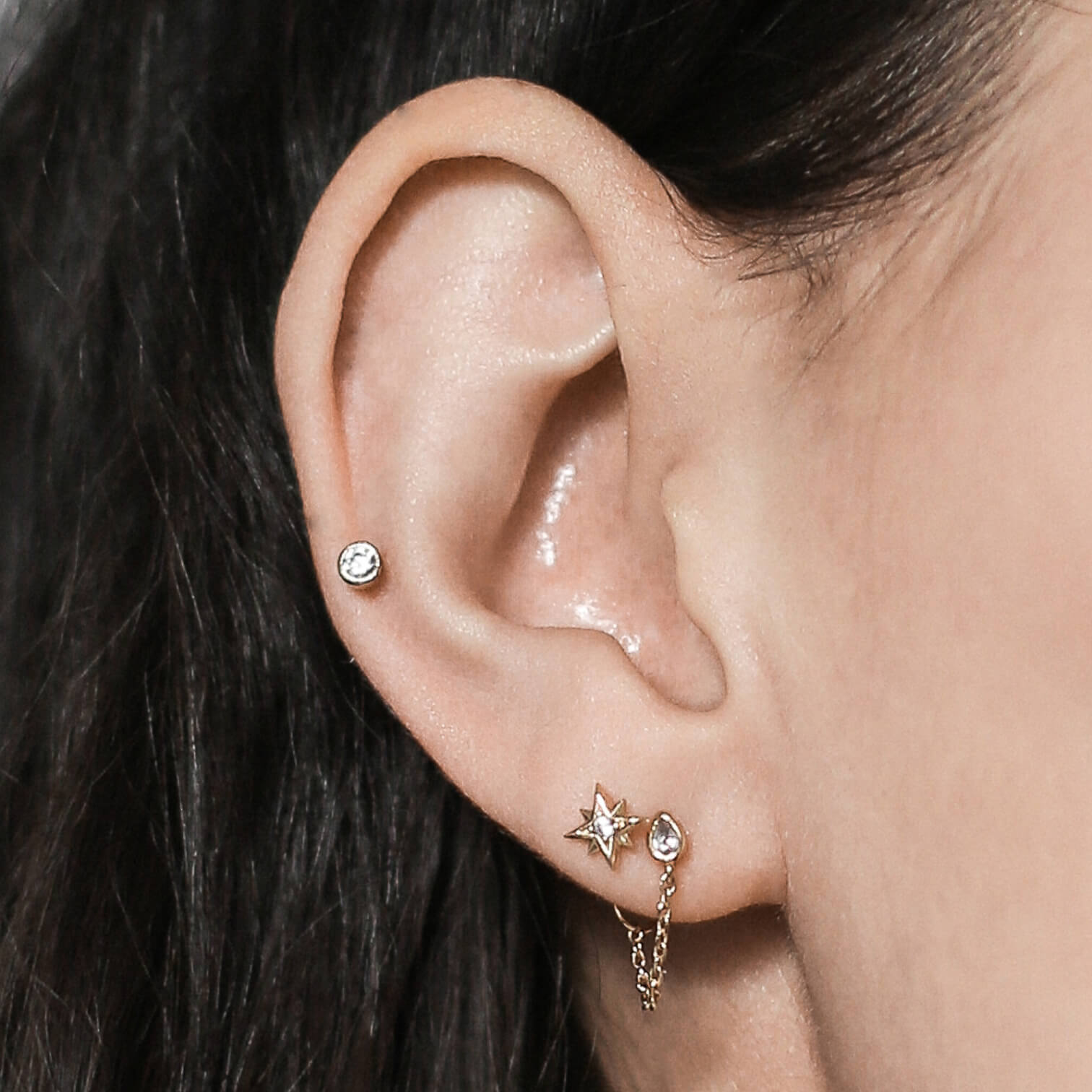 Tiny Crystal Threaded Flat Back Earring (Titanium - Gold) on model