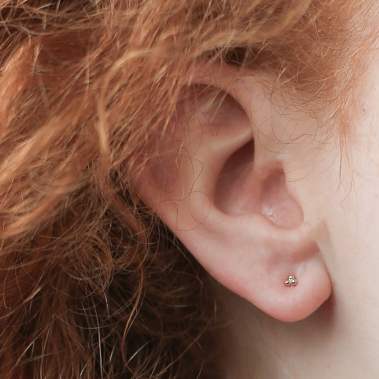 Tiny Trinity Nap Earrings (Gold) on model