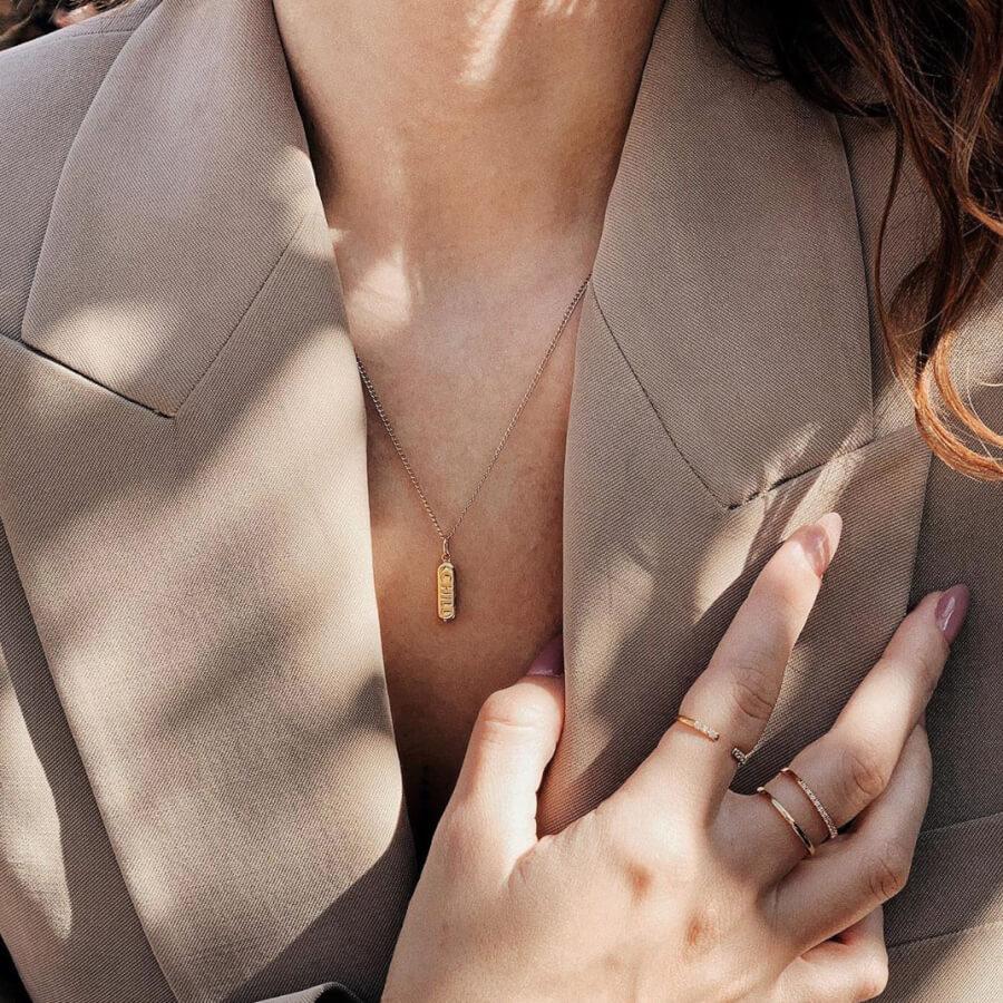 Chill Pill Charm Necklace (Gold) on model