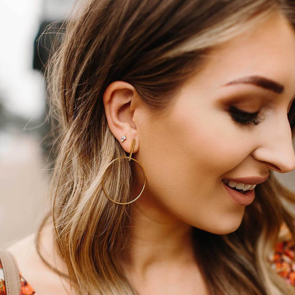 Gaia Nap Earrings in Gold on model
