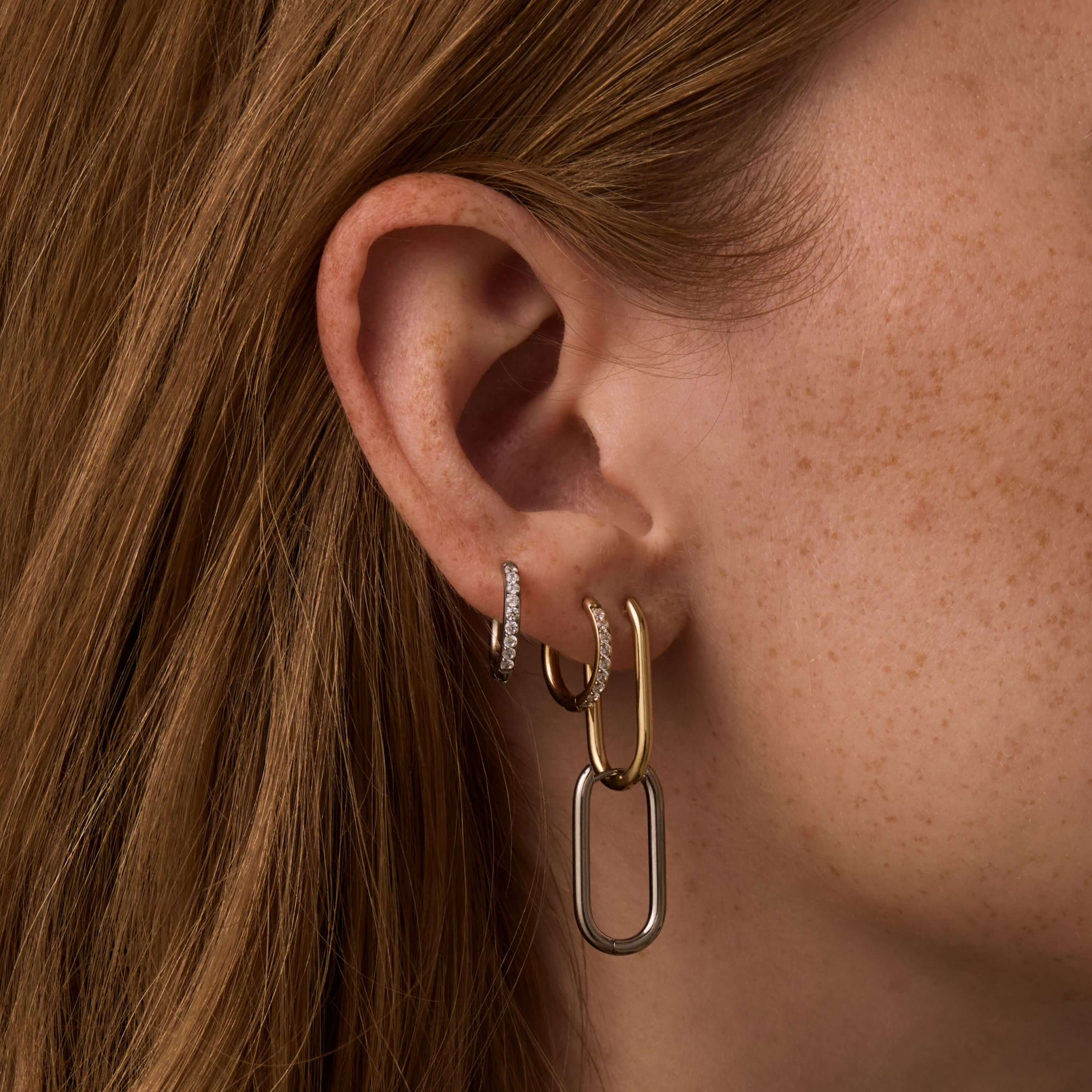 Pave Hoops, 14mm and Halo Oval Hoops, 23mm in Gold and Silver on Model