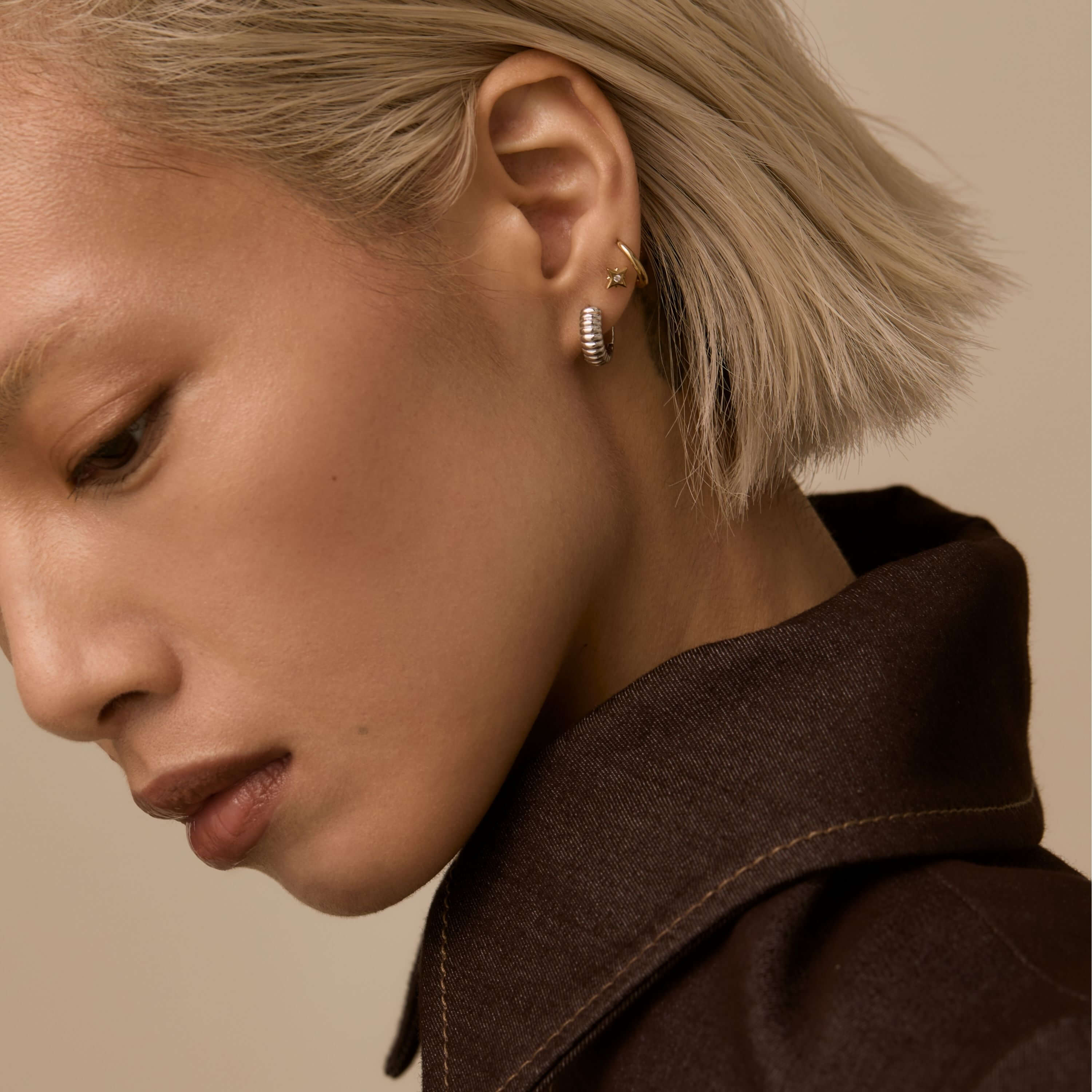 Plisse Huggie Hoops, 13mm and Classic Huggie Hoops, 11mm with North Star Nap Earrings on Model