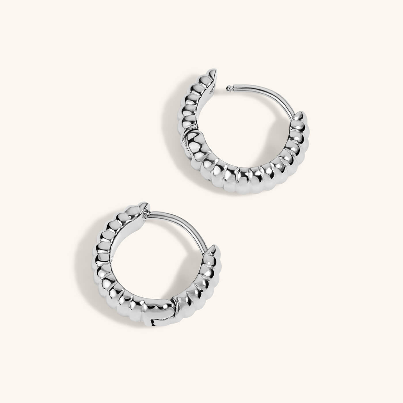 Plisse Huggie Hoops in Titanium - Silver
