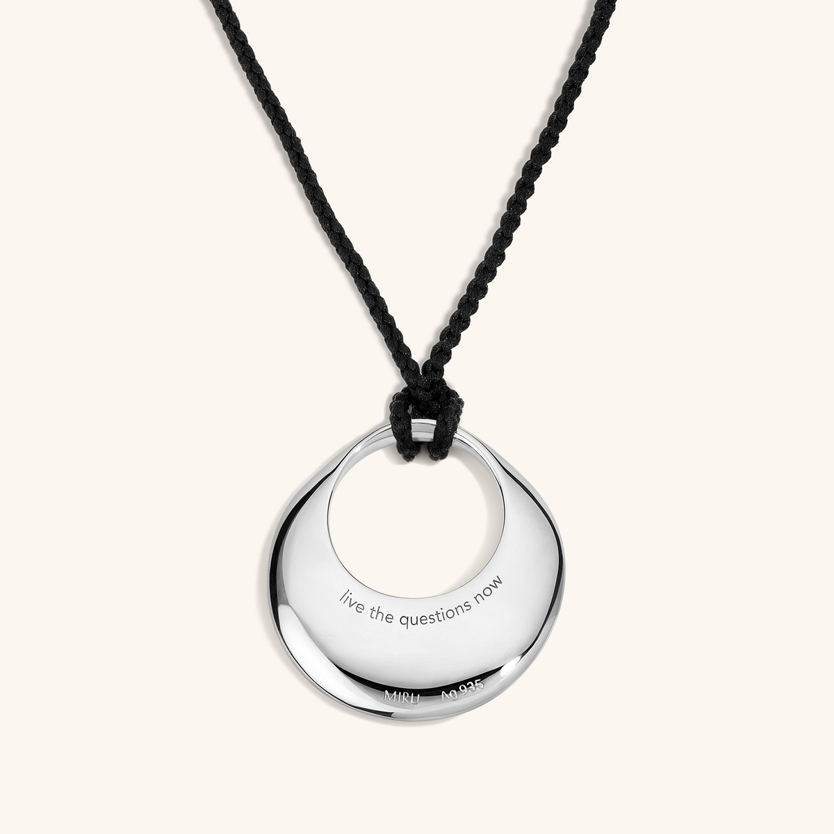 Equilibrium Fine Pendant Necklace - Back in Sterling Silver Close Up (Phrase: live the questions now)