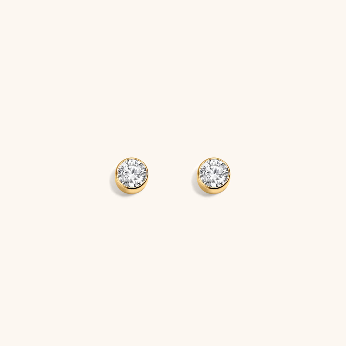 Tiny Crystal Studs in Titanium (Gold)