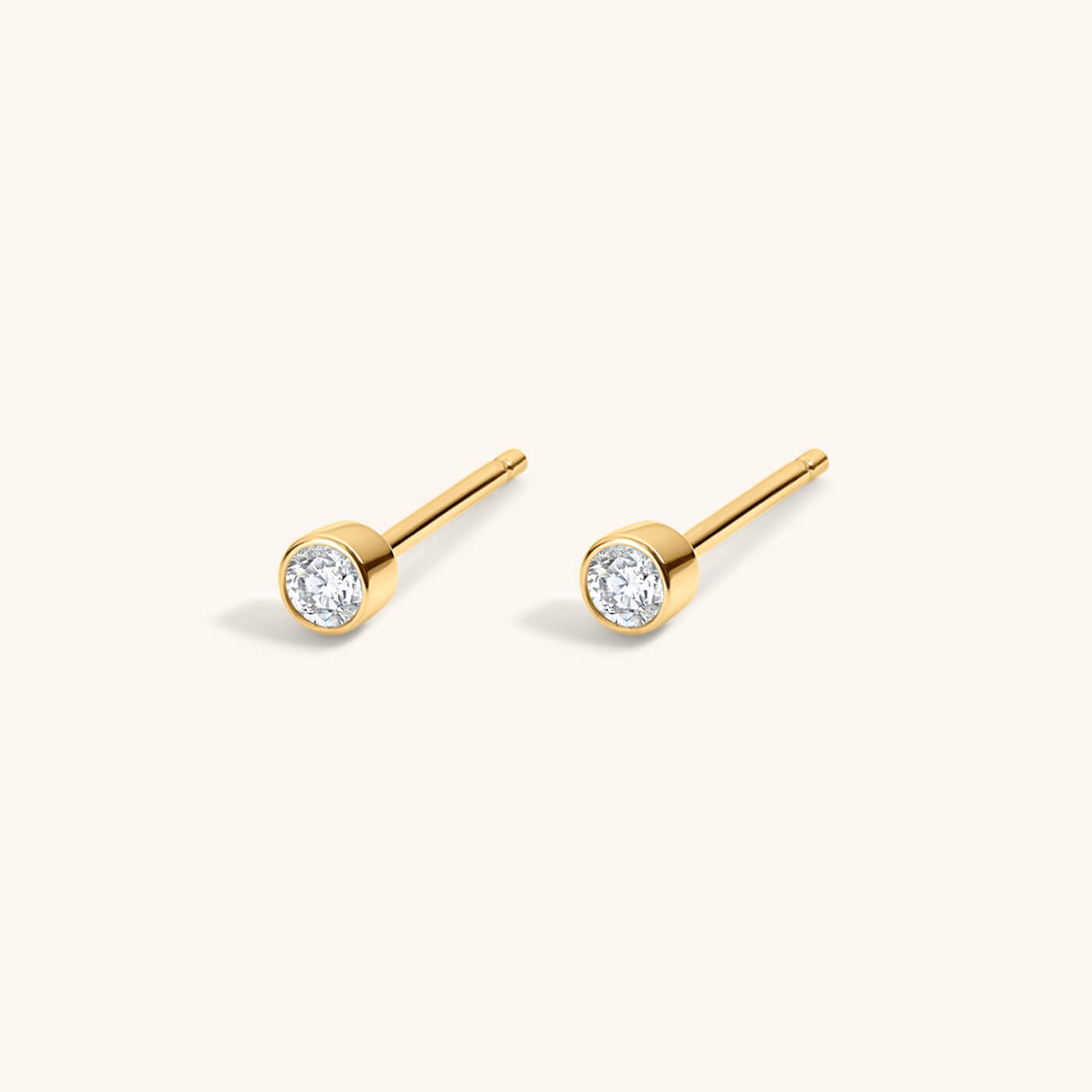 Tiny Crystal Studs in Titanium (Gold)