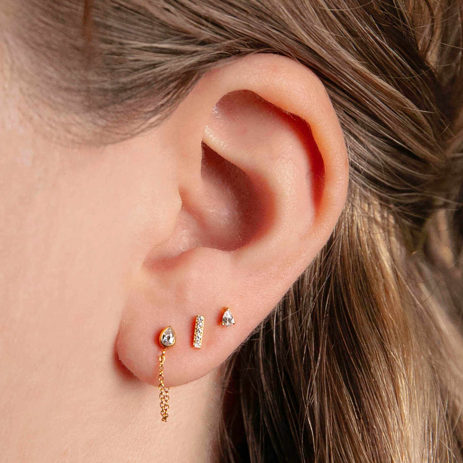 Iconic Nap Earrings Trio in Gold on model