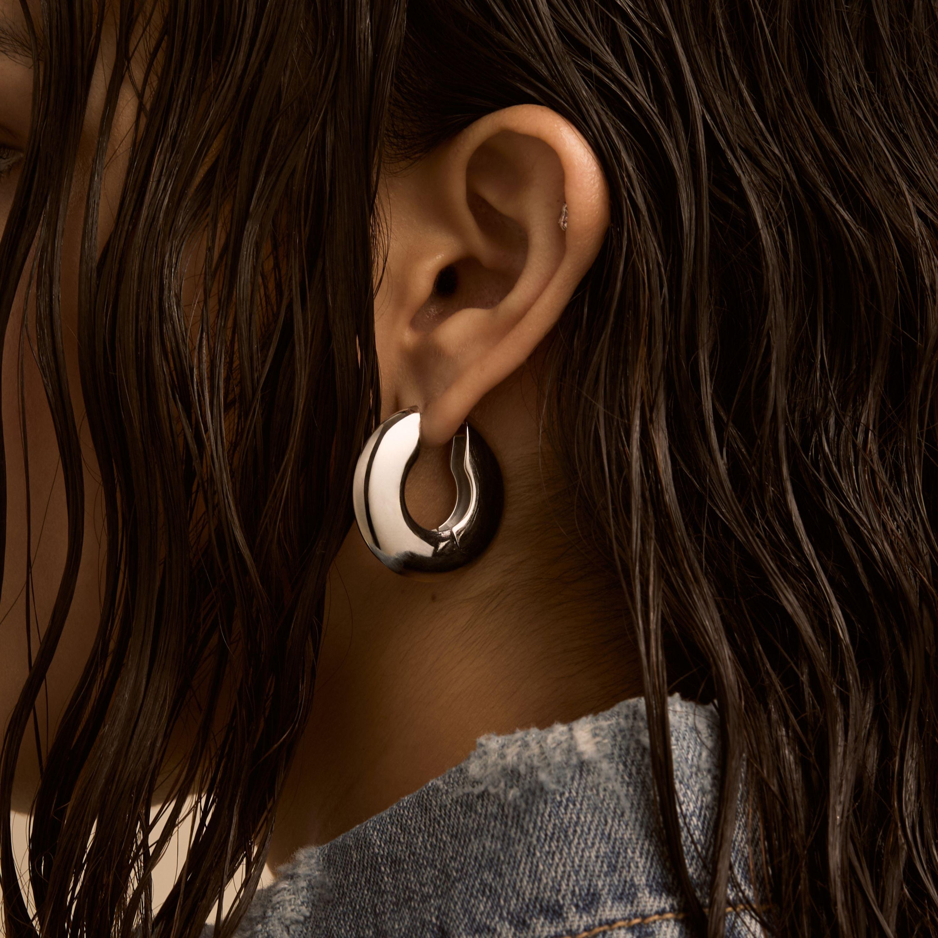 Puffy Disc Hoops (Silver) on model