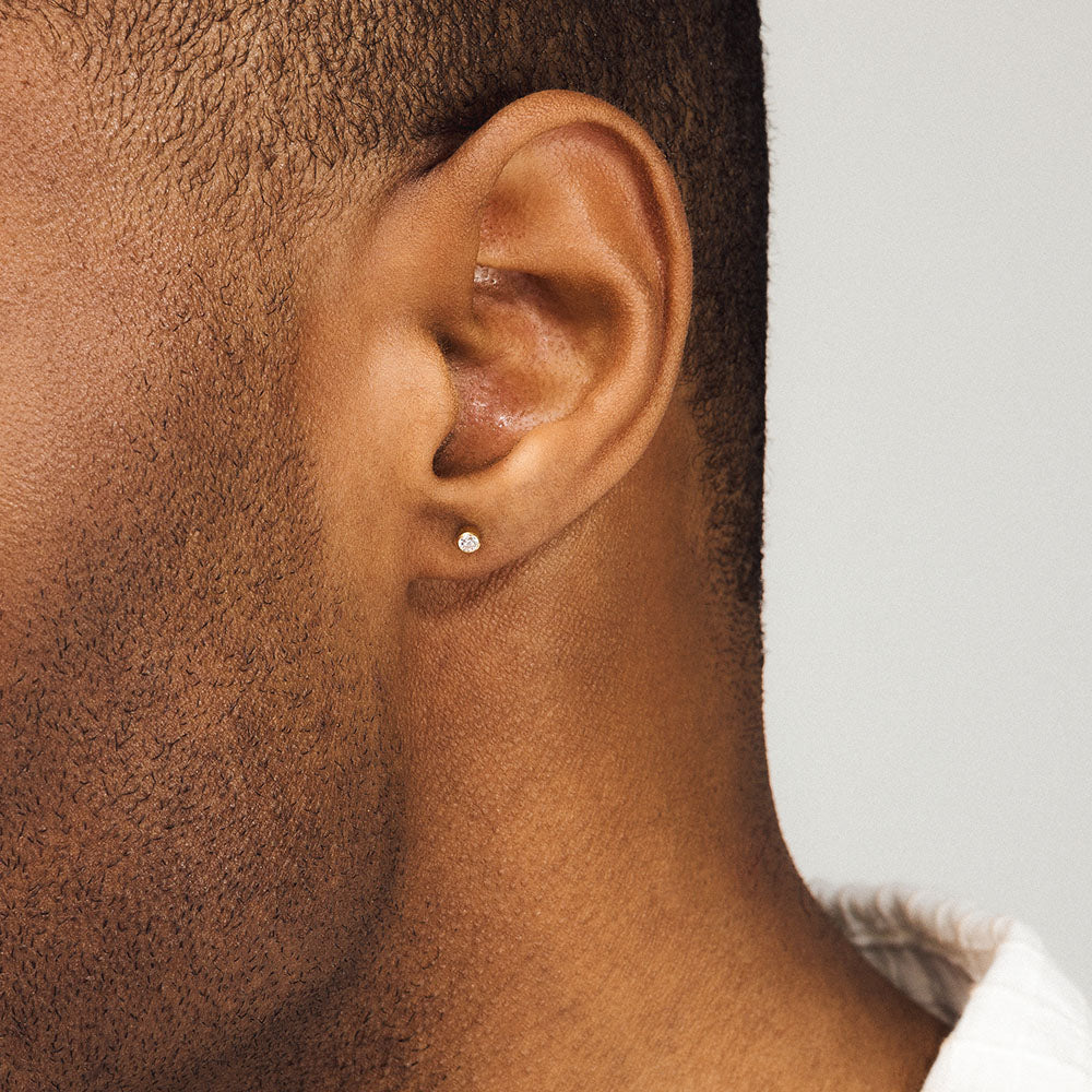 Tiny Crystal Push Pin Flat Back Earring in Gold on model