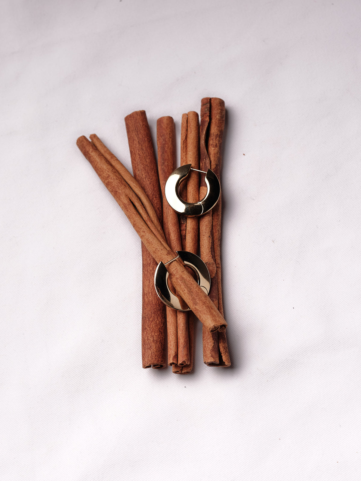 Disc hoops on cinnamon sticks