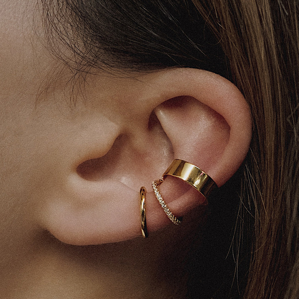 @thewhiteocean wearing the Essential Ear Cuff Trio