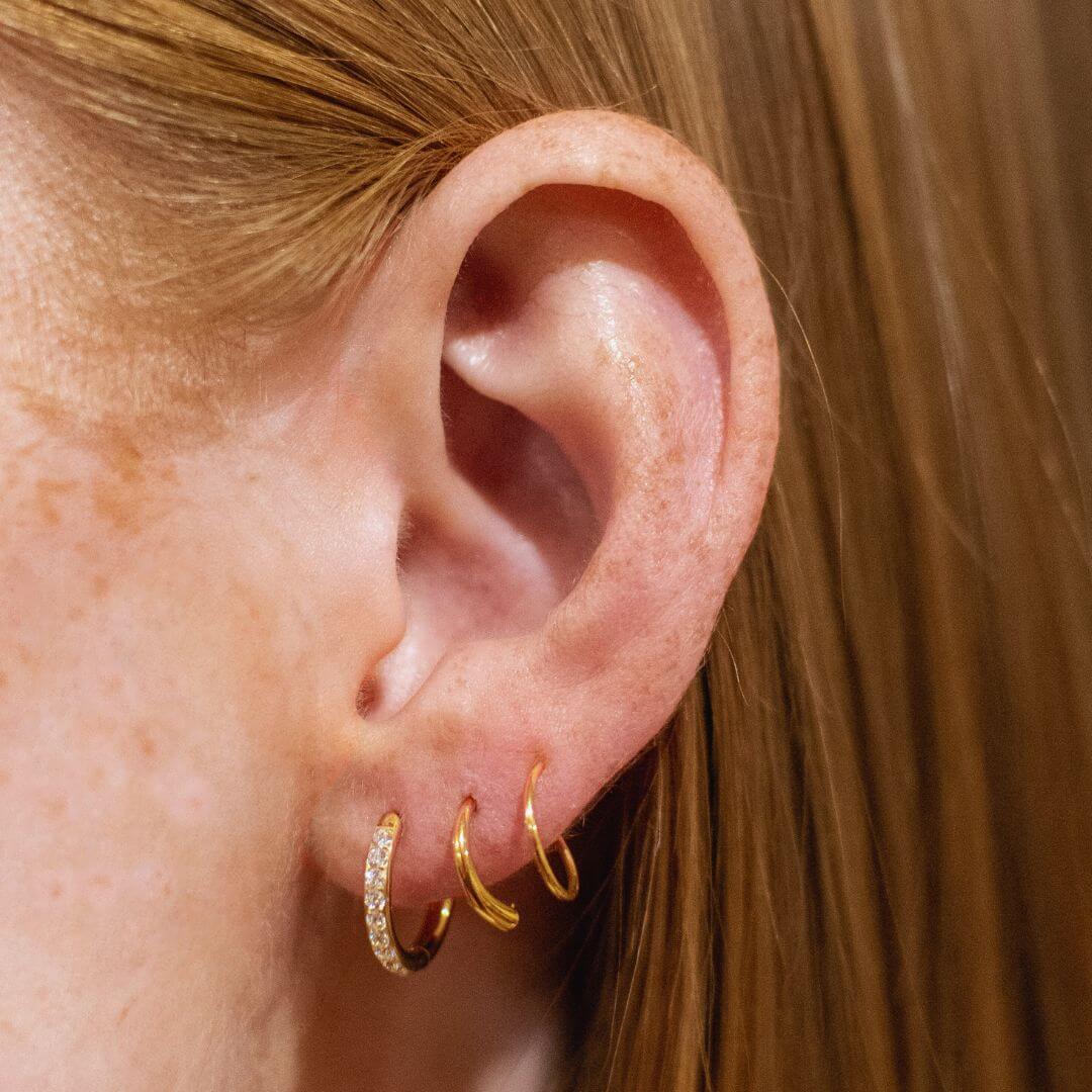 Pave Hoops, 14mm and Twirl Hoops (Gold) on model