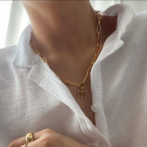 Initial Charm Necklace in Gold on model