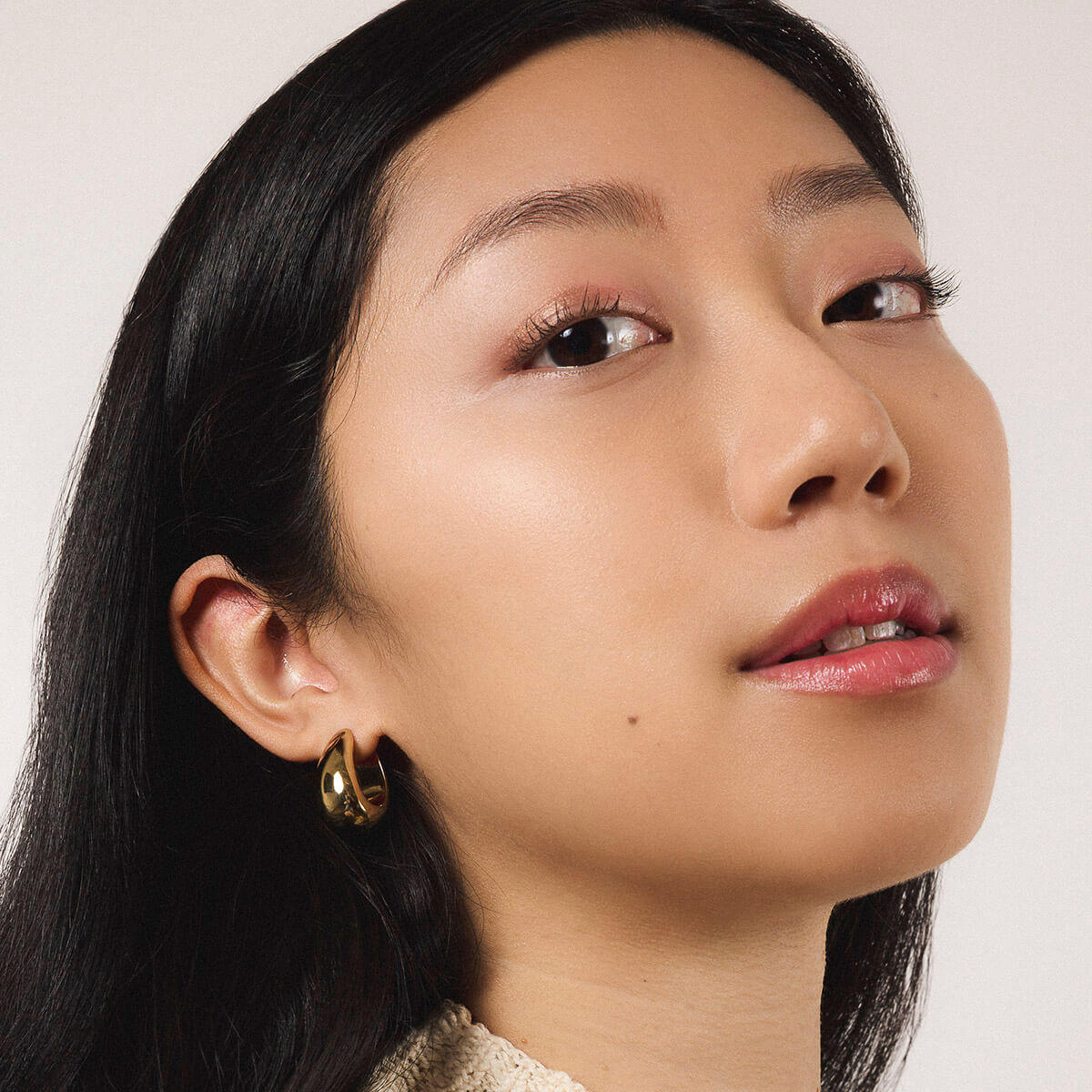 Dewdrop Hoops in Titanium - On Model (Gold)