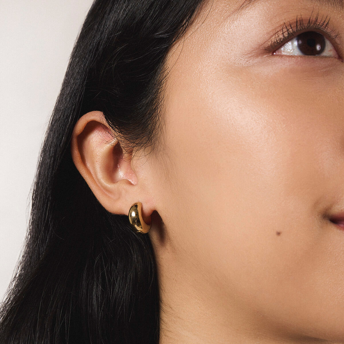 Dewdrop Huggies in Titanium - On Model (Gold)