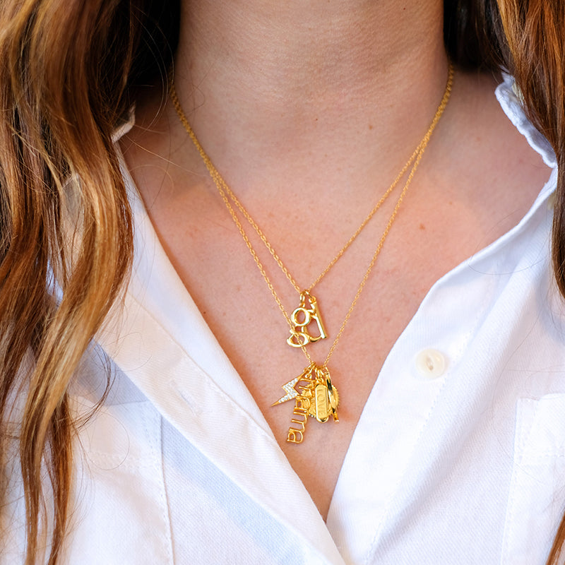 Gold charm necklaces, Secrets and Stories collection