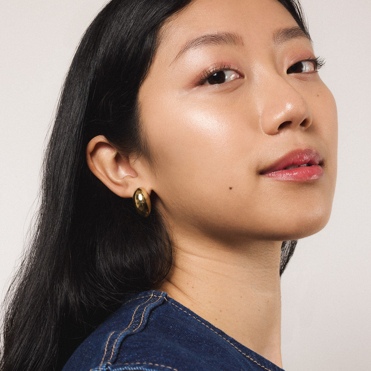 Large Oval Studs in Gold - On Model