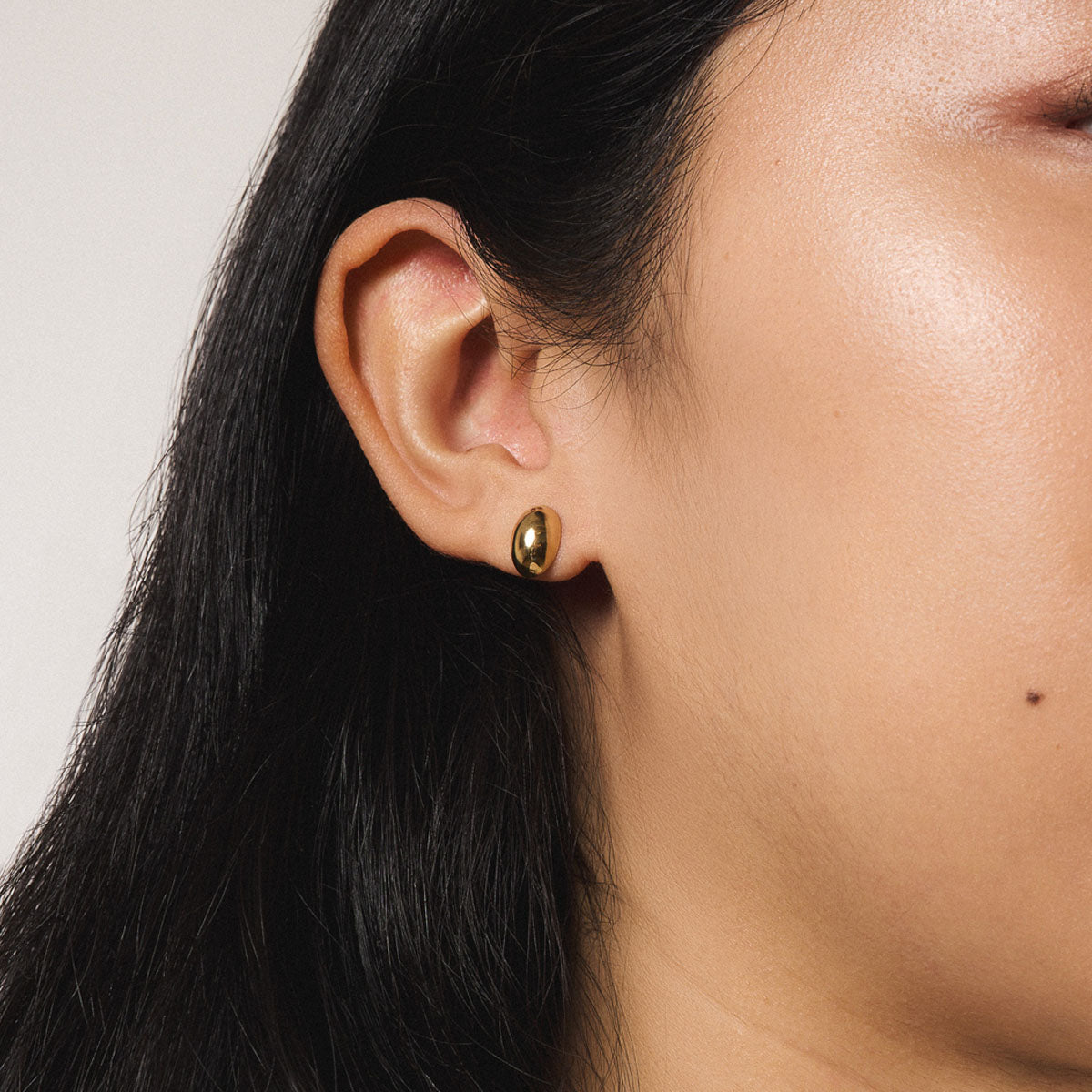 Oval Studs in Gold - On Model