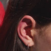 Mini Eternity Hoop Earrings in Titanium (Gold) on model video