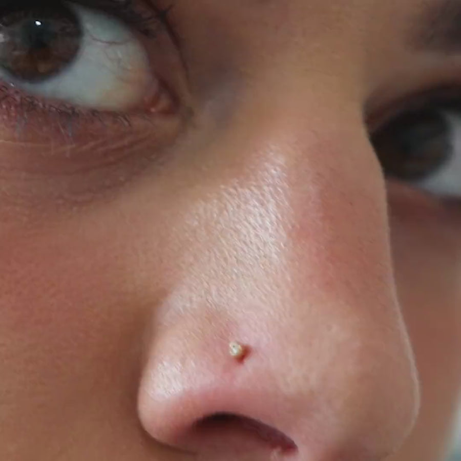 Tiny Diamond Stud L-Shape Nose Ring in 14k Gold on model video