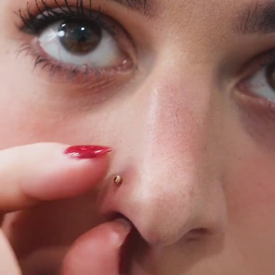 Tiny Secret Stud L-Shape Nose Ring in 14k Gold on model video