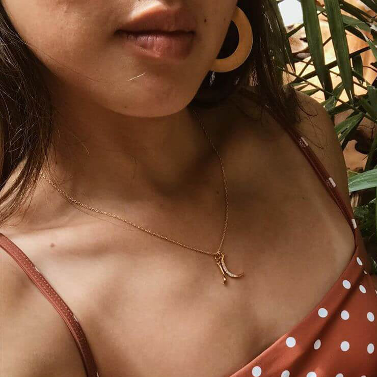 @juleschiem wearing the Initial Charm Necklace and Pave Moon Charm