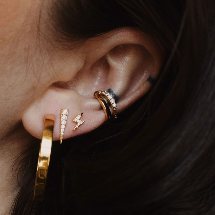 @sometimesbutno wearing lightning bolt jewelry