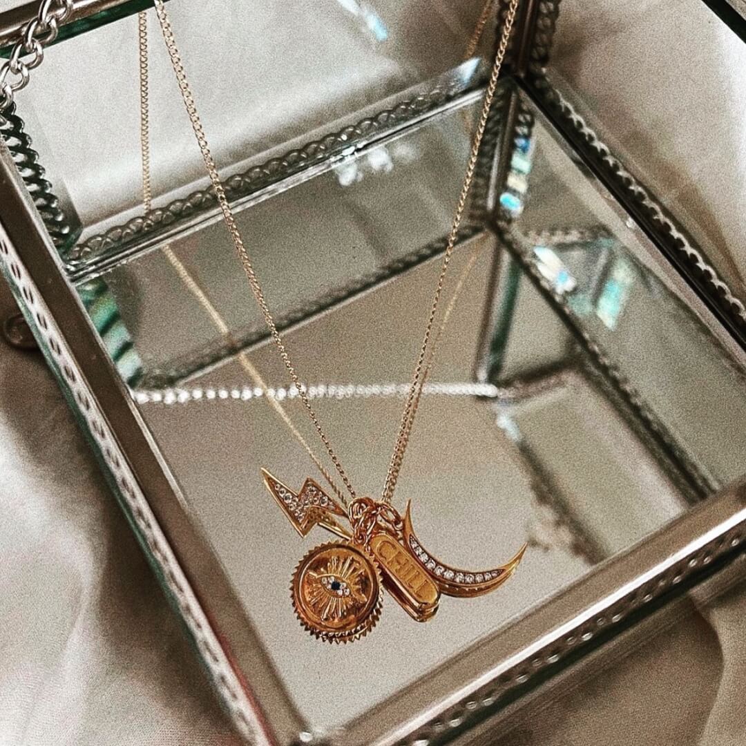 @whaddupbecks styling the Pave Lightning Charm Necklace with charms