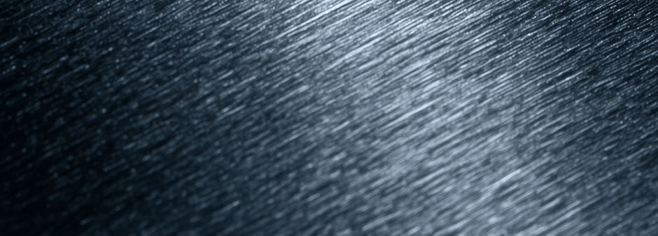 Textured dark gray surface with a subtle pattern