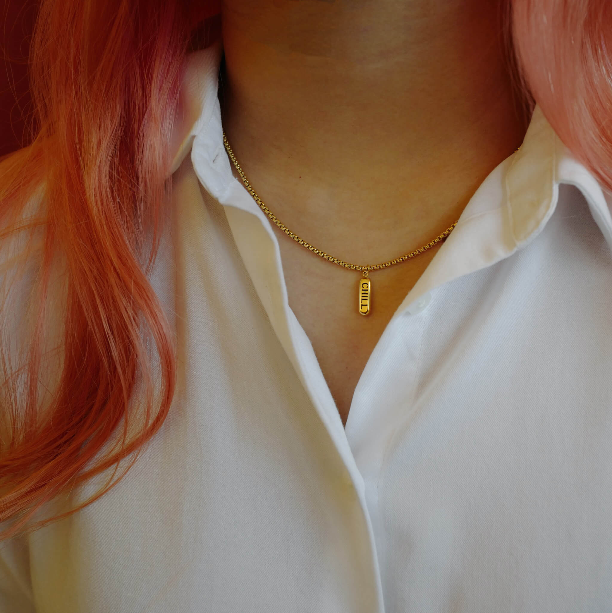 Chill Pill Necklace (Gold) on model