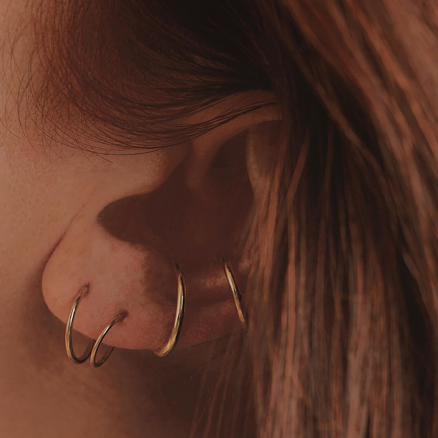 Classic Cartilage Hoop on model (Titanium - Gold)