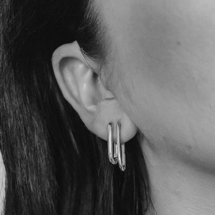 Bold Halo Oval Hoops in Sterling Silver on Model