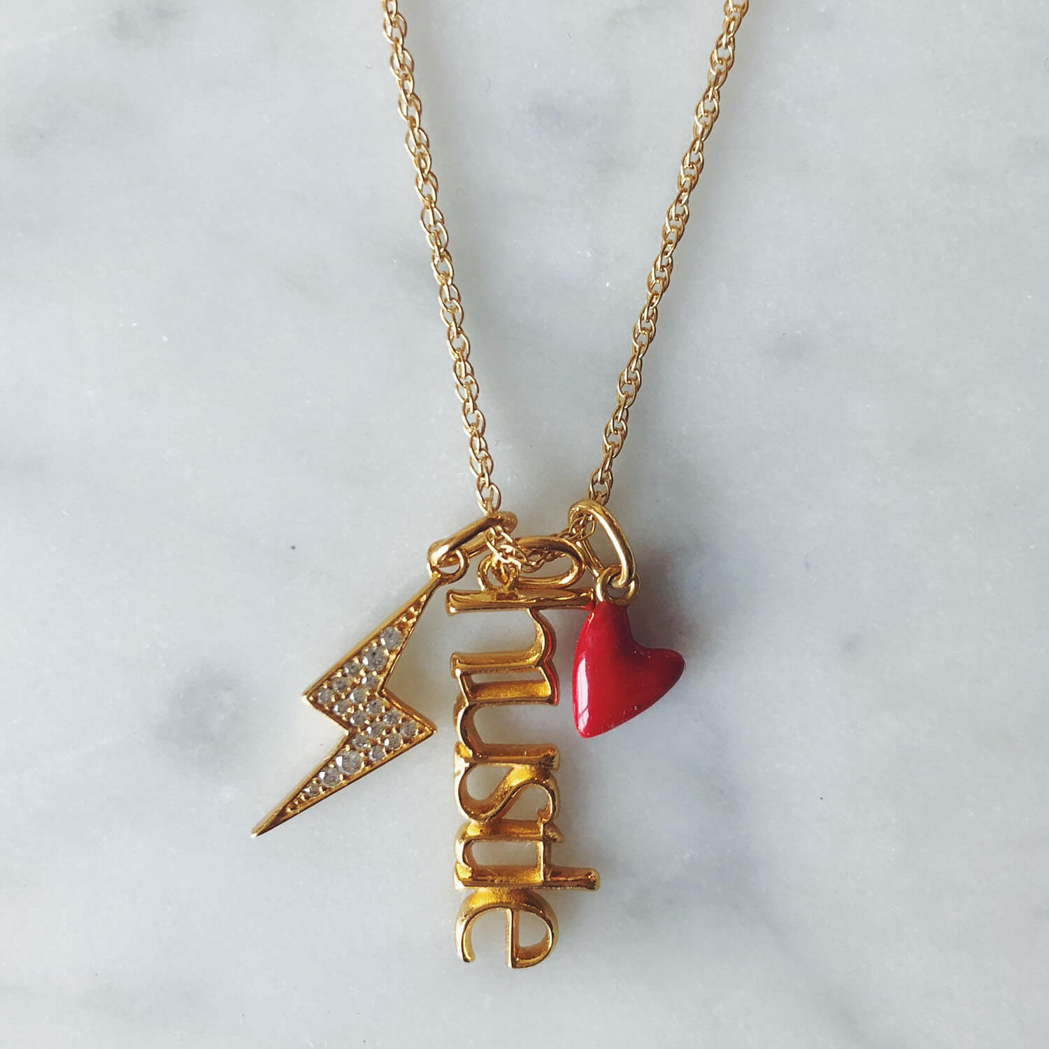 Hustle Charm (Gold Vermeil) on Necklace
