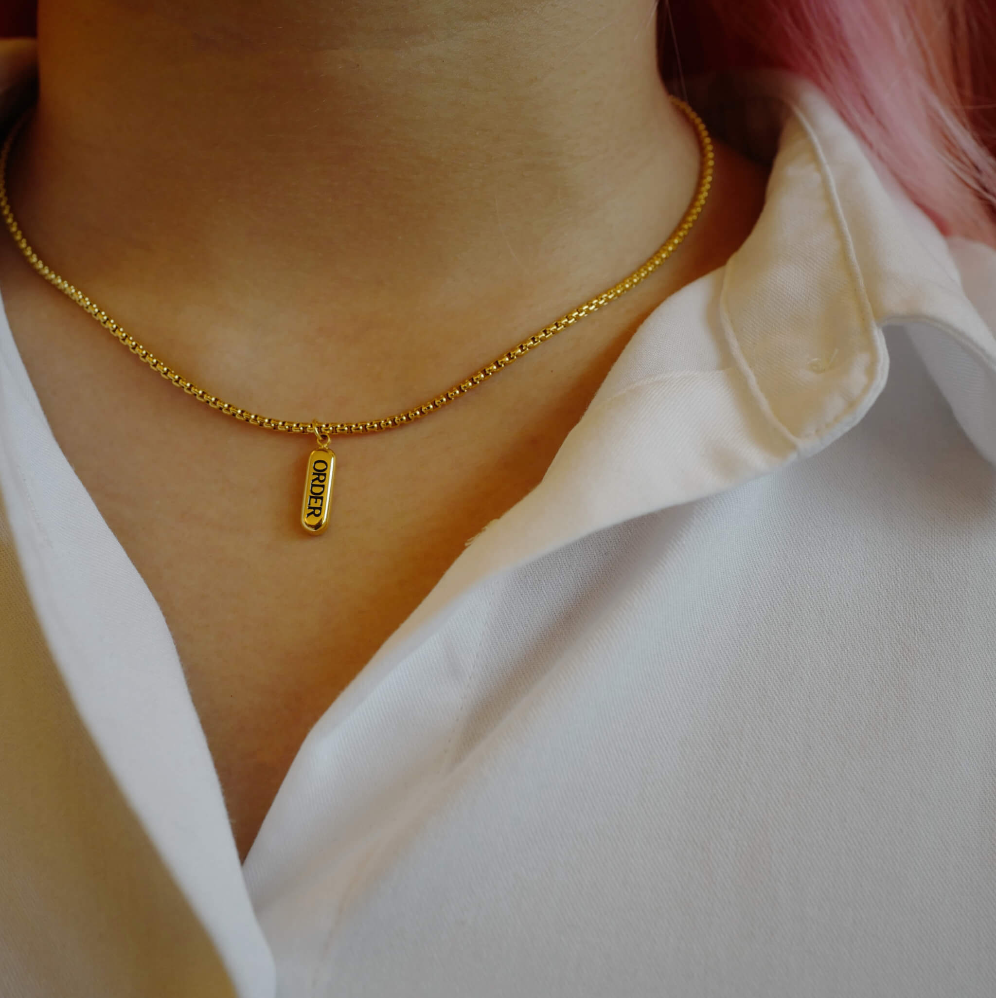 Chaos and Order Necklace in Gold on model