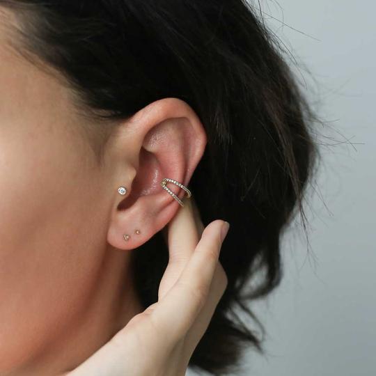 Tiny Trinity Threaded Flat Back Earring in 14k Gold on model