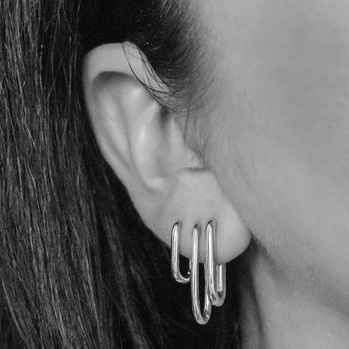 Bold Halo Oval Hoops in Sterling Silver on Model