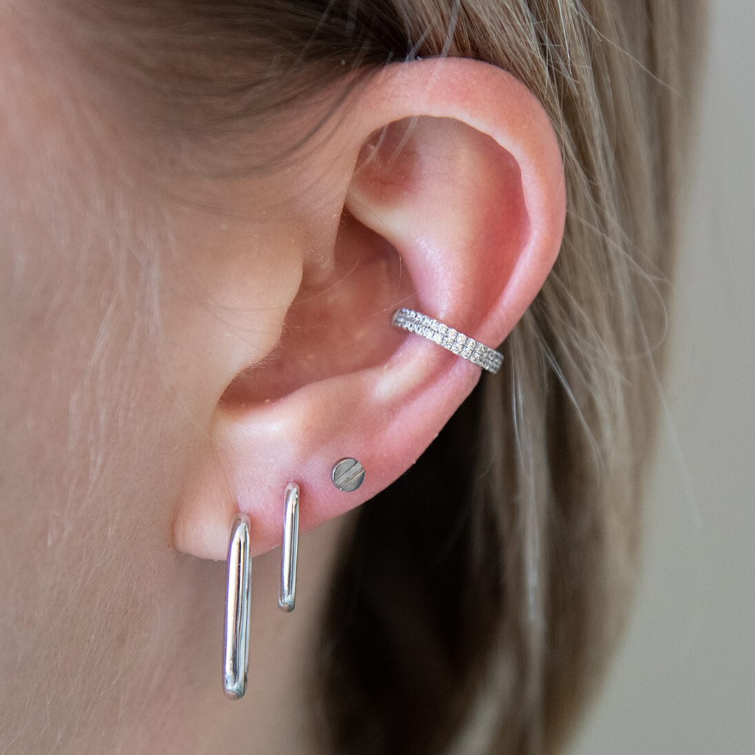 Bolt Push Pin Flat Back Earring on model (Titanium - Silver)