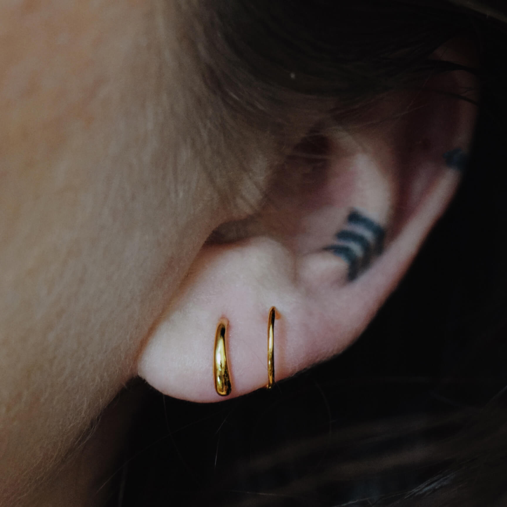 Classic Twirl Earrings in Sterling Silver on model