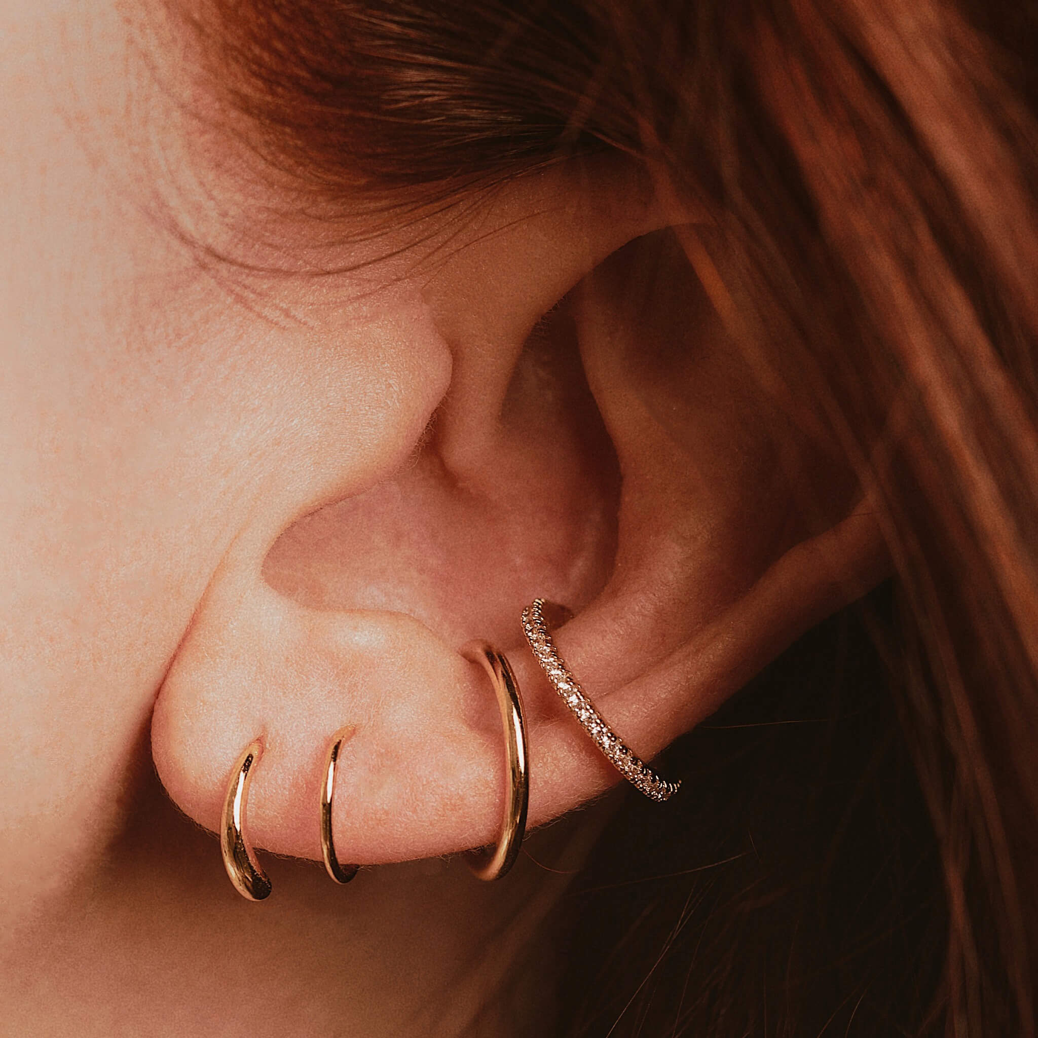 Classic Twirl Earrings in Sterling Silver on model