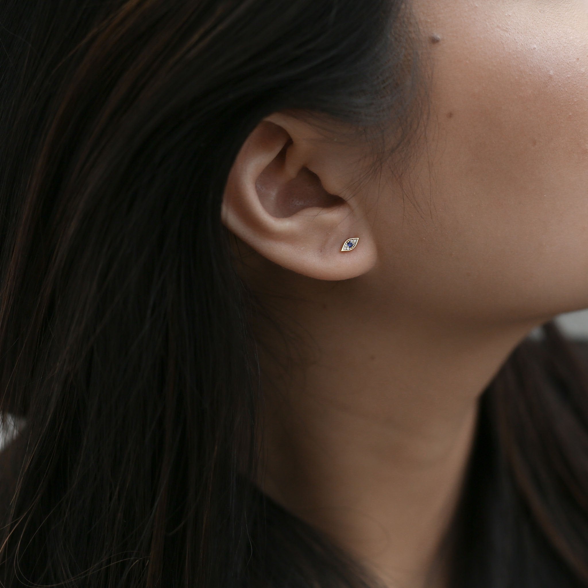 Evil Eye Threaded Flat Back Earring (Titanium - Gold) on model